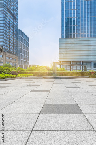 empty pavement front of modern office buildings