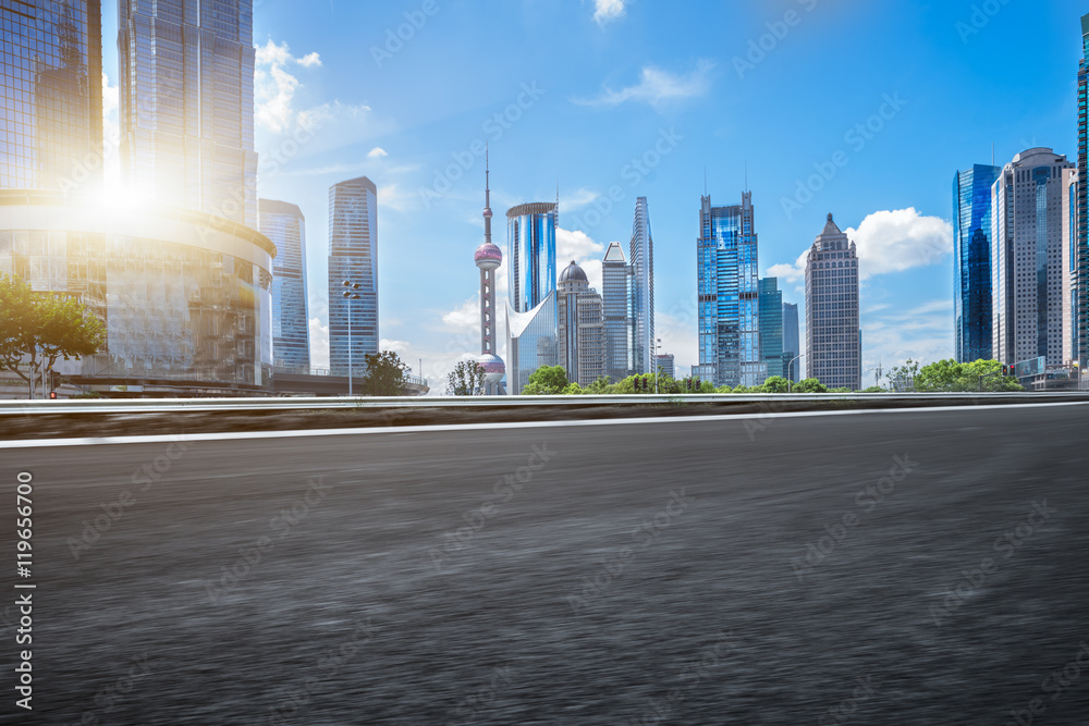 Obraz premium empty asphalt road with cityscape and skyline of Shanghai