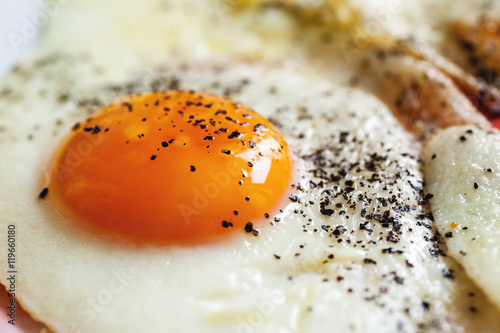 Fried eggs with black pepper
