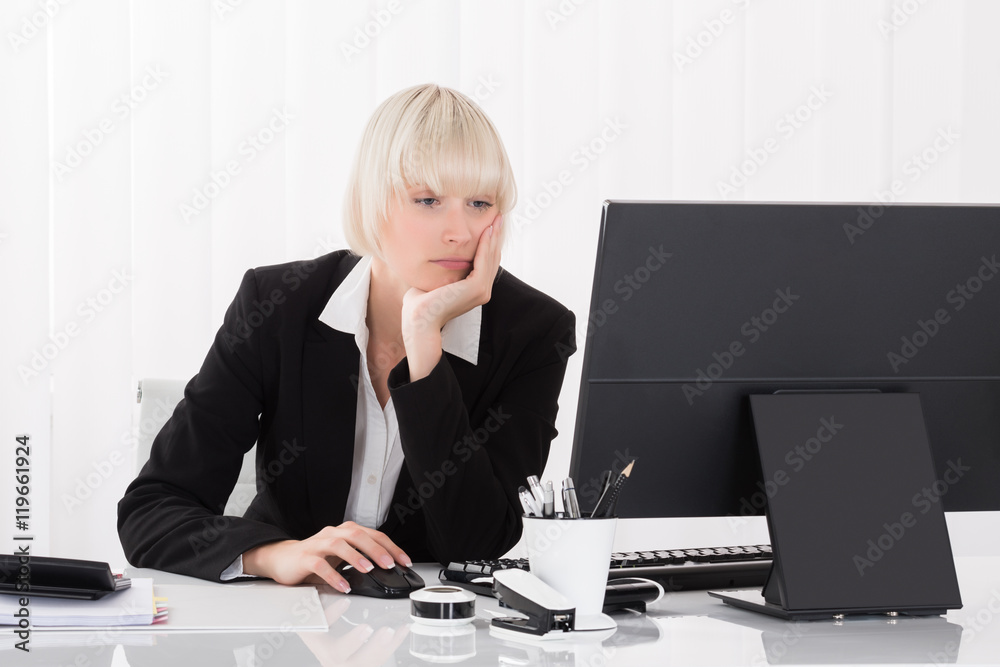 Tired Young Businesswoman Working On Computer Tired Young Businesswoman Working On Computer