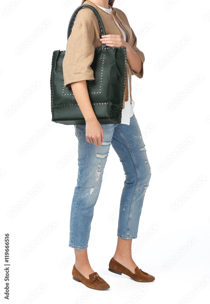 Naklejka premium Woman holding a handbag isolated on white background
