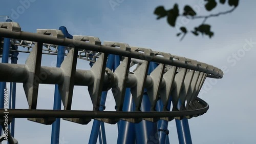 Roller Coaster Ride on Sky Background. Amusement Park Leisure for all family photo