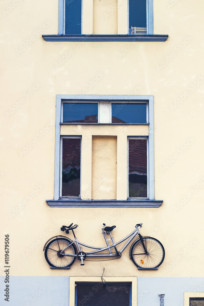 Bike on facade of building as a decoration
