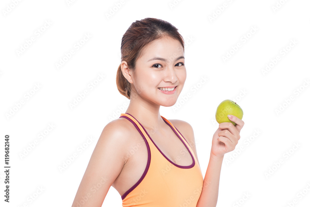Isolated brown hair fitness woman with an apple Isolated brown hair fitness woman with an apple