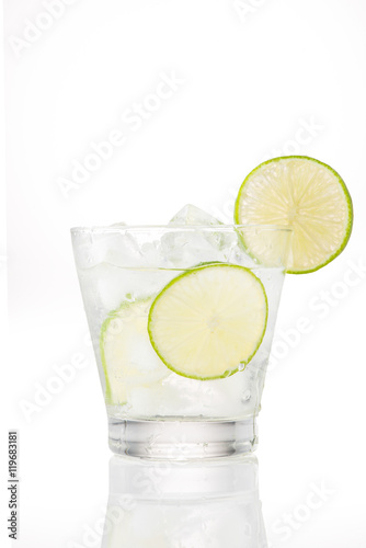 Full glass of water with lemon and mint isolated on white background