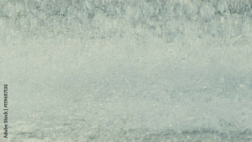 closeup of water splashing in the fountain Slow motion video closeup of water splashing in the fountain Slow motion video