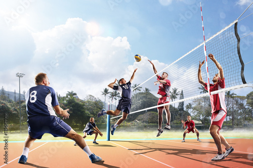 Professional volleyball players in action on the court