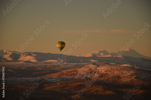 Winter Hot Air Balloon
Snow background flyer, in Cappadocia, Turkey photo