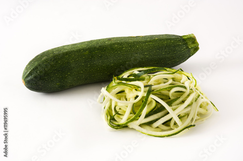 Delicious zucchini noodles isolated on white background

