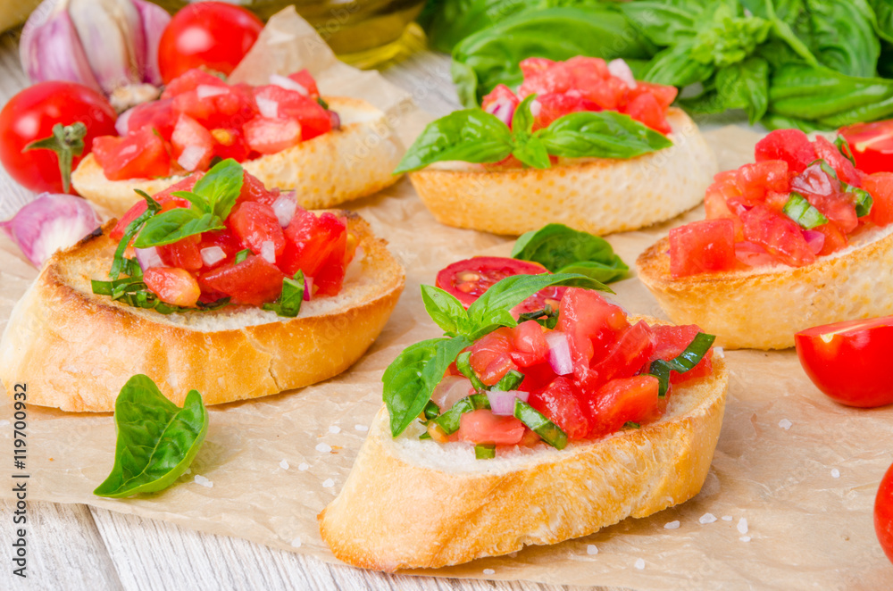 Bruschetta with tomato, onion and fresh basil Bruschetta with tomato, onion and fresh basil
