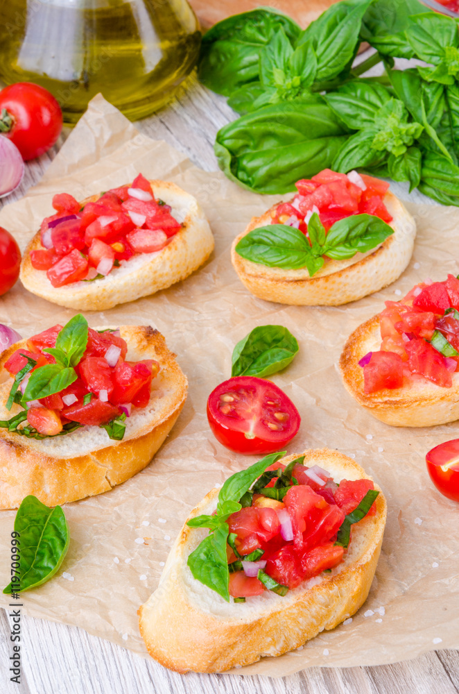 Bruschetta with tomato, onion and fresh basil Bruschetta with tomato, onion and fresh basil
