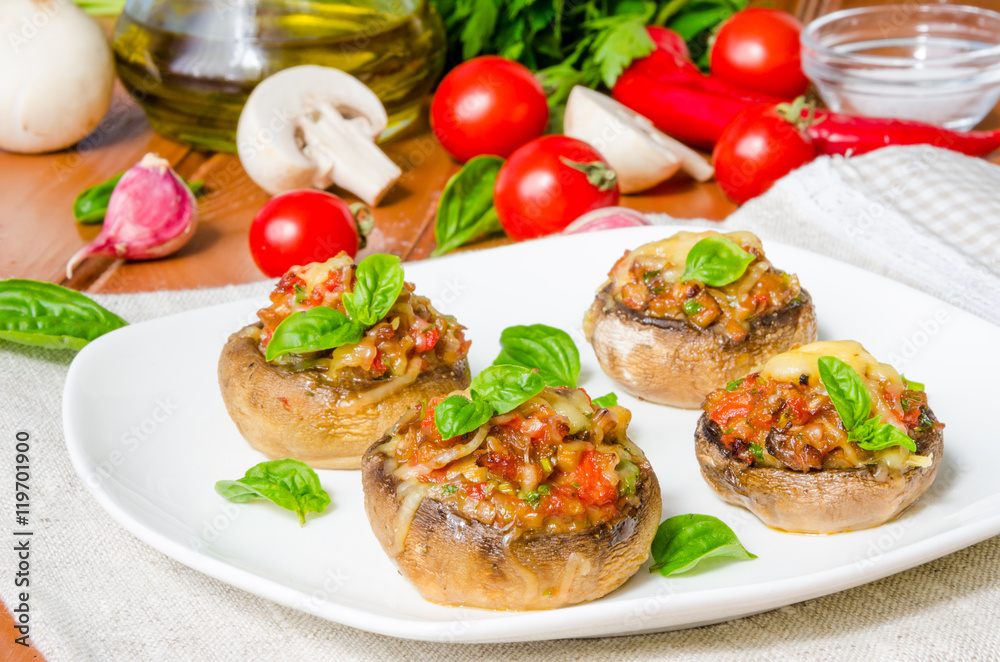 Mushroom caps stuffed with vegetables and cheese