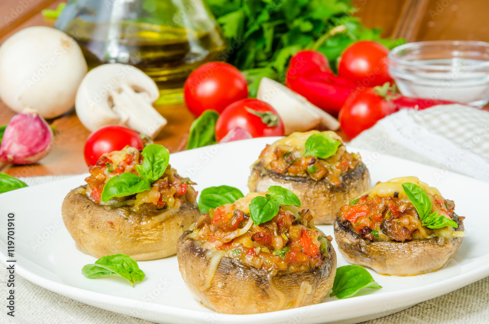 Mushroom caps stuffed with vegetables and cheese