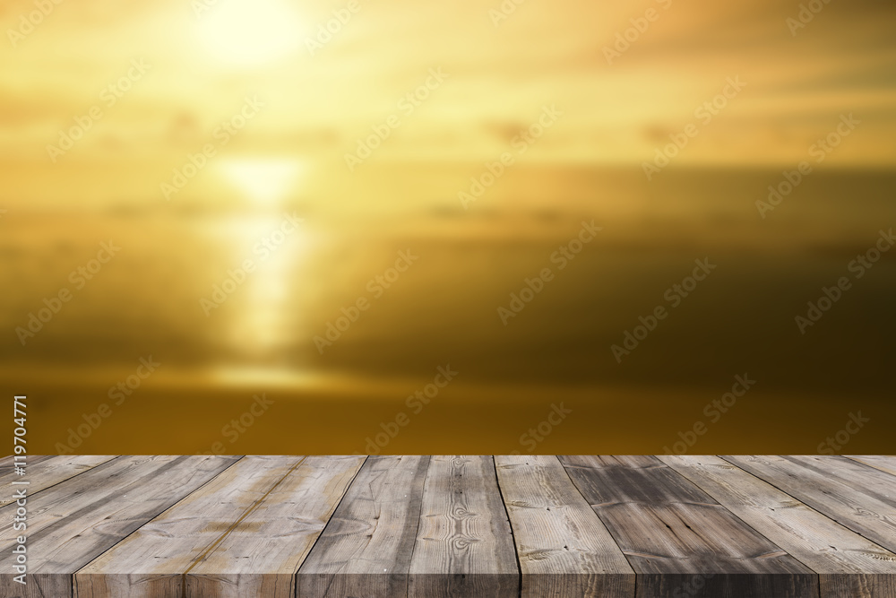 Wood table top on blur summer blue sea and sky background - can