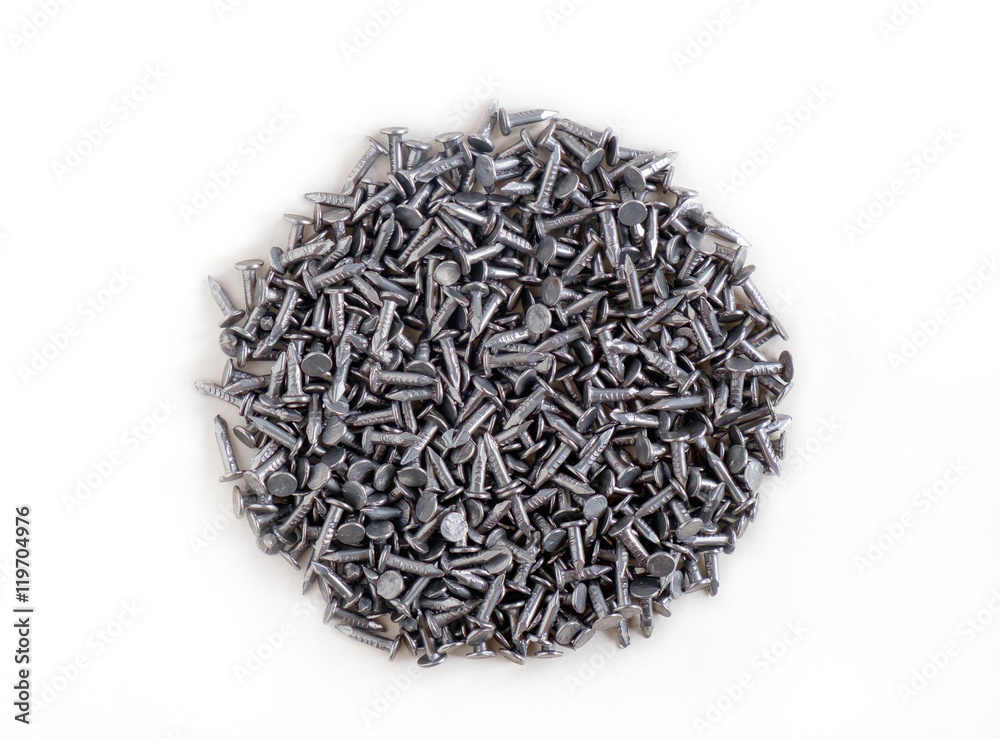 Tack / Heap of small tack on white paper background. Top view. Tack / Heap of small tack on white paper background. Top view.