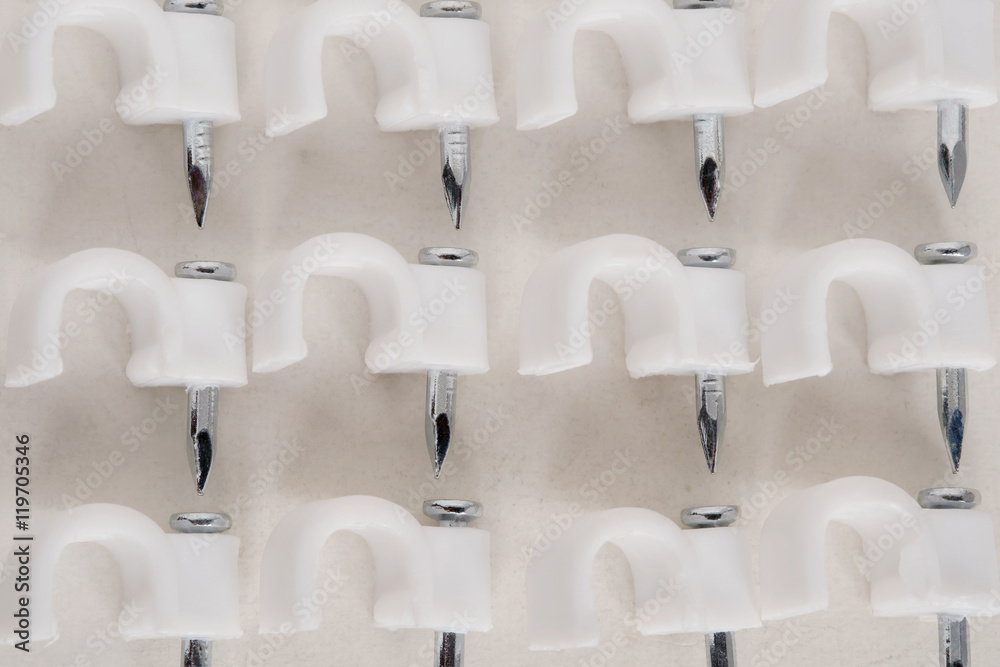 Fototapeta premium Clip cord / View of clip cord on dirty paper background. Top view. Flat lay.