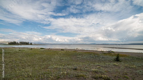 Beautiful clouds over the Yellowstone Lake  the largest lake at high elevation in North America. Pelican Creek Nature Trail  Yellowstone National Park  Wyoming