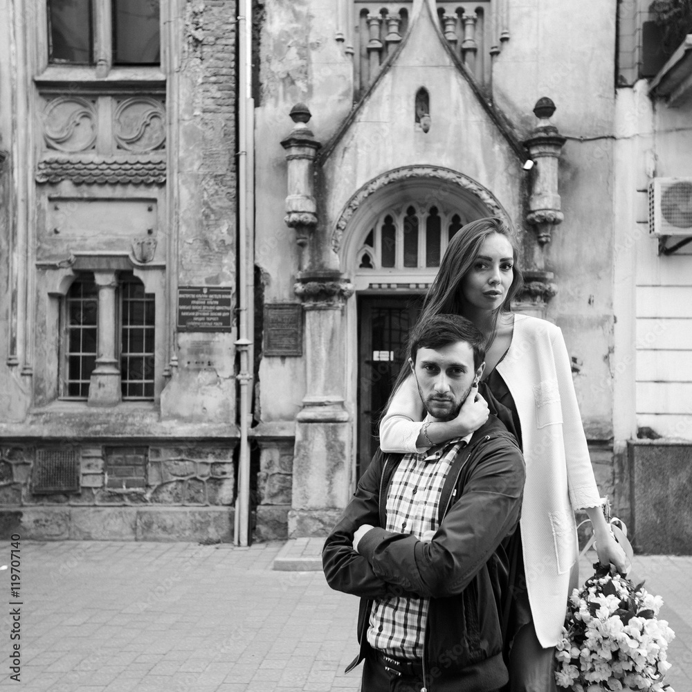 Fototapeta premium Black and white photo of cute young couple