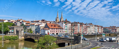Panorama of Bayonne with bridge Pont du Genie across the Nive river on the front view, Aquitaine, France photo