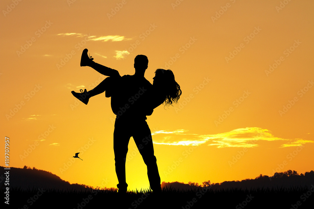 couple silhouette at sunset couple silhouette at sunset