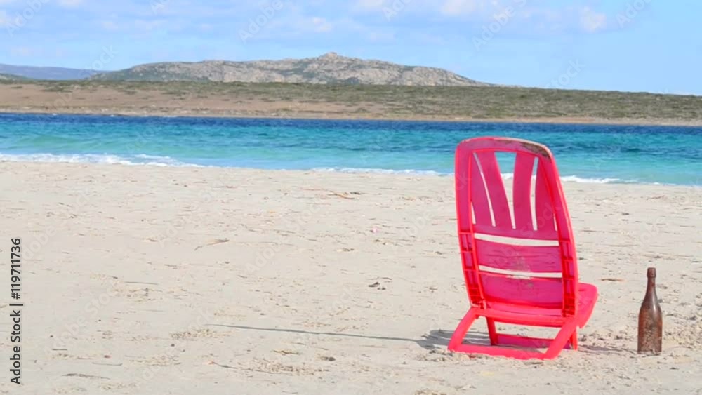 red plastic chair by the sea red plastic chair by the sea