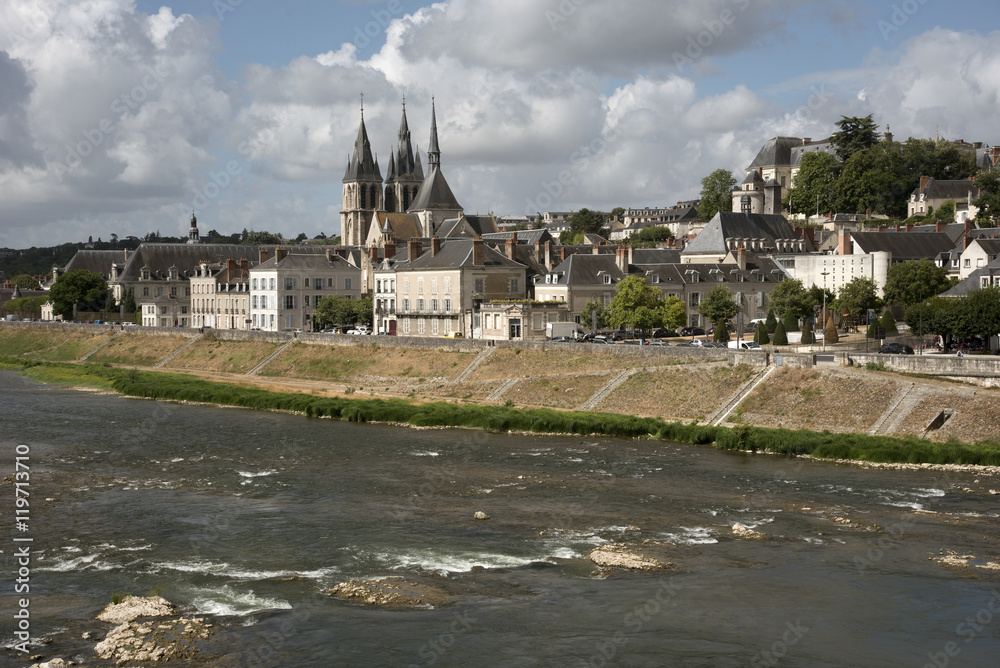 Blois France - The Chateau Royal and the Church of Saint Nicholas overlook the River Loire at Blois France