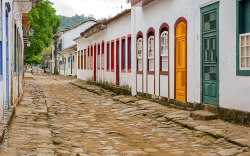 Street with old colonial style buildings in the historical town of Paraty in Rio de Janeiro