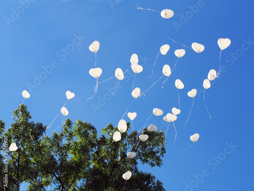 White balloons in the shape of heart