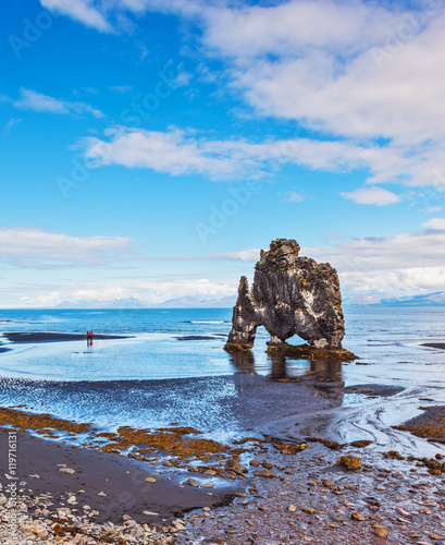  The picturesque cliff in the Bay of Huna im Iceland photo