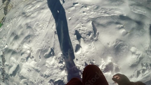 POV of climber walking through deep snow photo