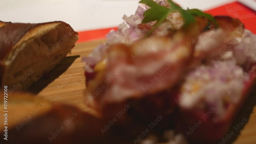Raw tartar meat served with bacon Raw tartar meat served with bacon