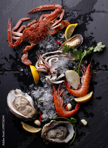 Fresh Seafood ,Crab Shrimp Oyster on stone background