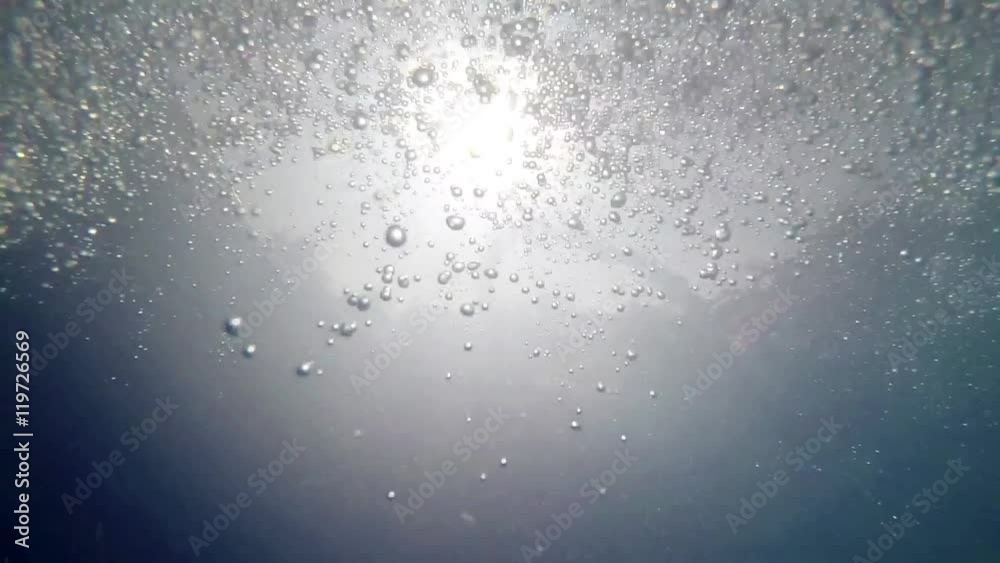 Underwater Bubbles against sun shine Slow Motion Underwater Bubbles against sun shine Slow Motion