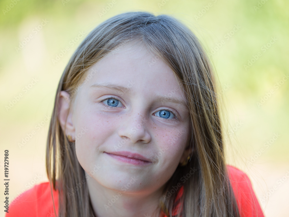 Beautiful young girl outdoors, portrait children close up Beautiful young girl outdoors, portrait children close up