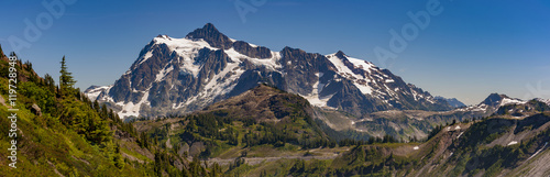 Mt. Shuksan, Washington.  Mount Shuksan may be one of the most photographed mountains in the Cascade Range seen here on the Chain Lakes Loop Trail. Mt. Baker National Forest. photo