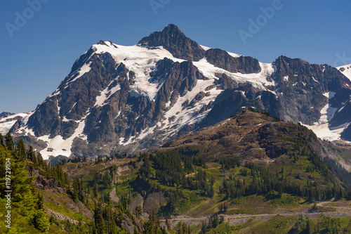 Mt. Shuksan, Washington.  Mount Shuksan may be one of the most photographed mountains in the Cascade Range seen here on the Chain Lakes Loop Trail. Mt. Baker National Forest. © LoweStock