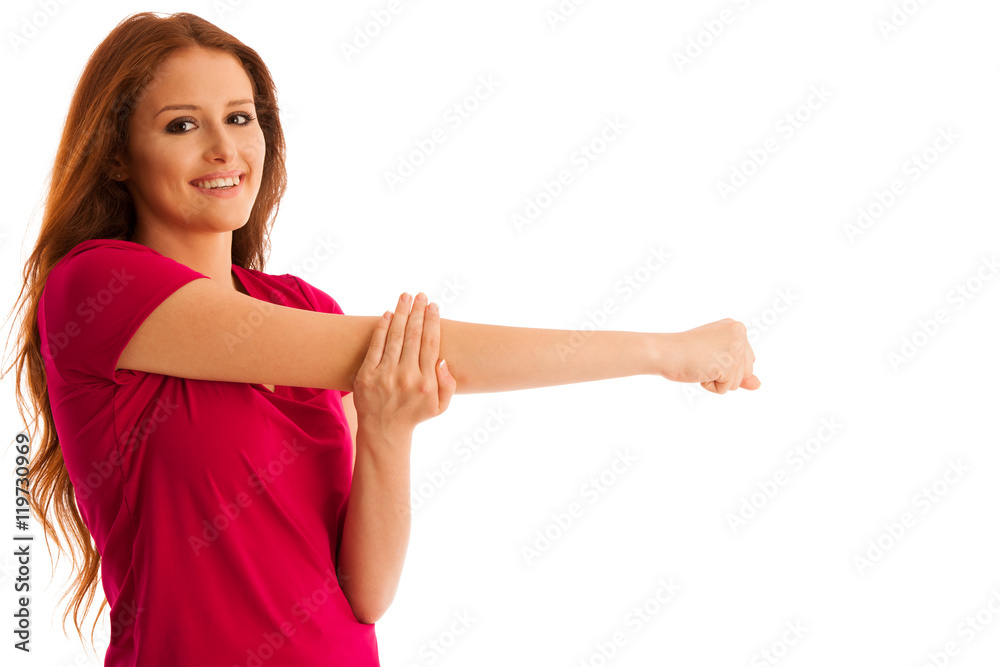 stretching - woman stretches arm muscles after fitness workout i stretching - woman stretches arm muscles after fitness workout i