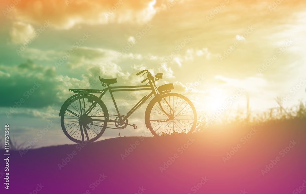 Fototapeta premium beautiful landscape image with Bicycle at sunset