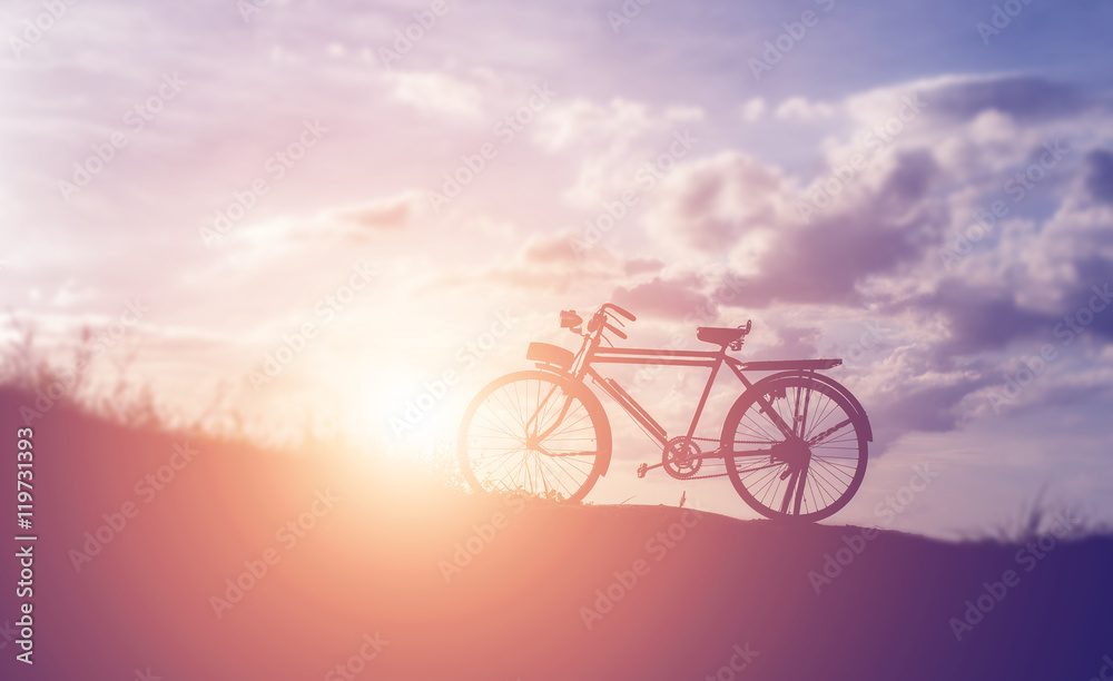 Obraz premium beautiful landscape image with Bicycle at sunset
