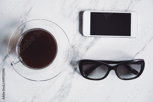 coffee, sunglasses and phone
