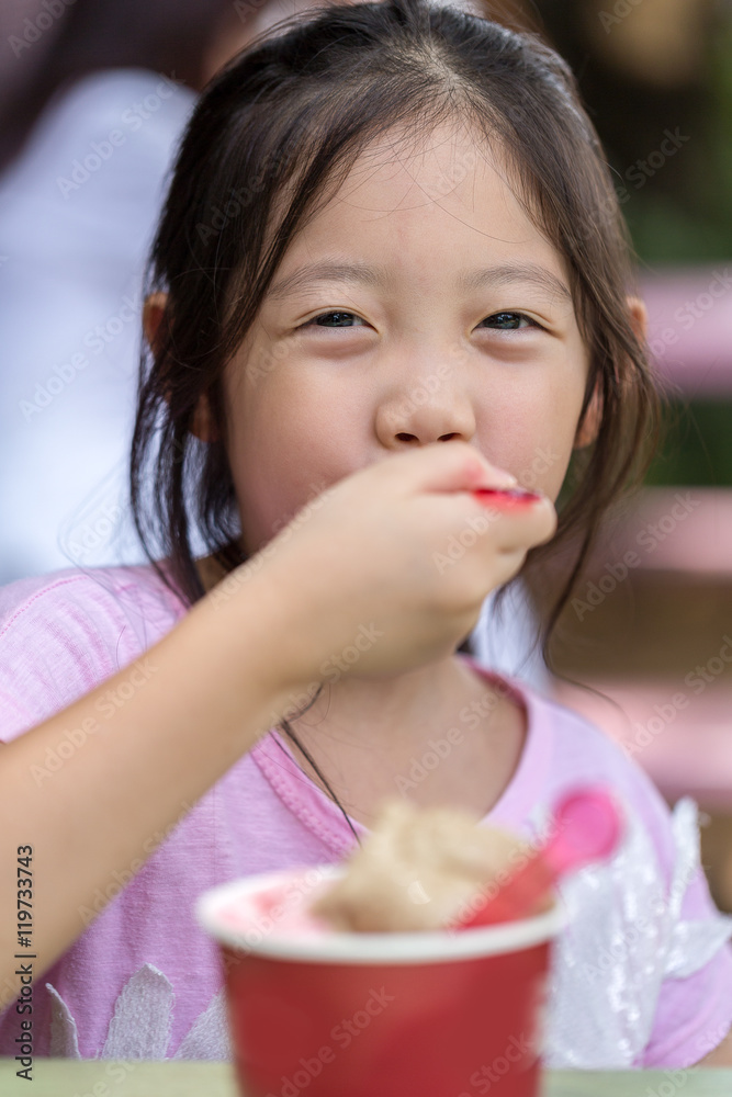 Happy Kid Eating Ice Cream