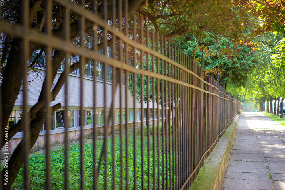 Perspective. Fence on the street. Perspective. Fence on the street.