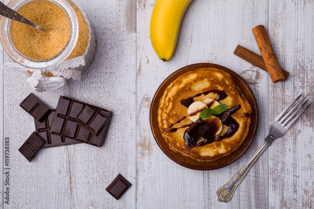 Delicious pancakes with bananas and chocolate. Delicious pancakes with bananas and chocolate.