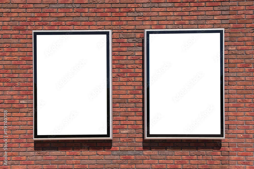 Empty billboard with on a red brick wall Empty billboard with on a red brick wall