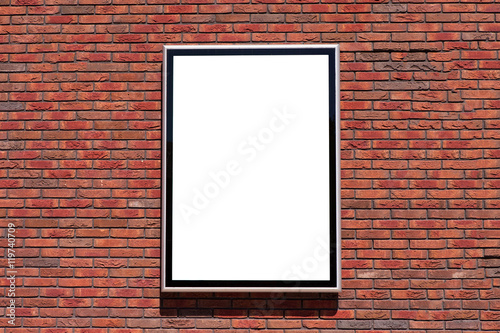 Empty billboard with on a red brick wall