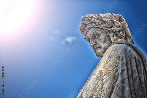 The famous poet Dante Alighieri's statue in Piazza Santa Croce in Florence, Italy photo