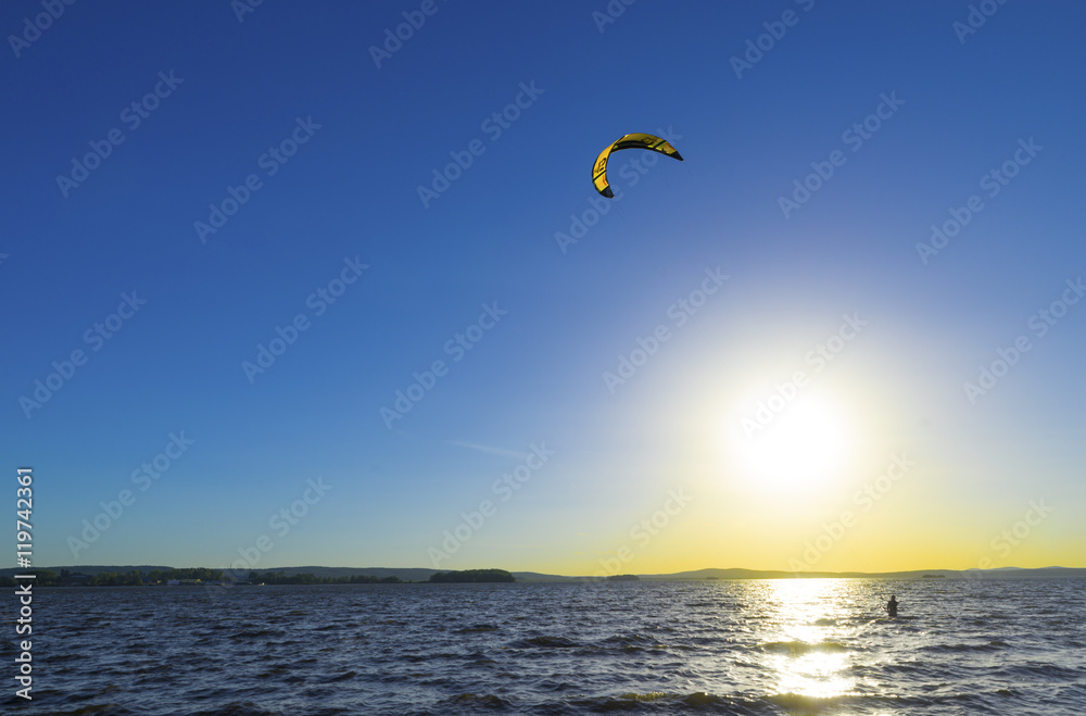 Slipping through the waves with a parachute Slipping through the waves with a parachute