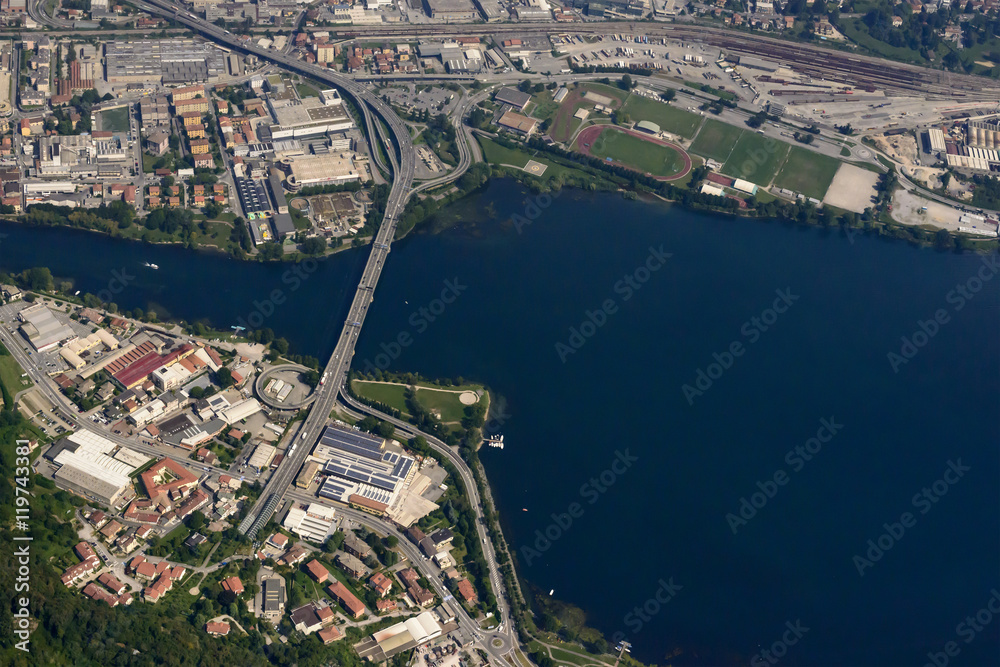 aerial of highway bridge over Adda river, Lecco, Italy