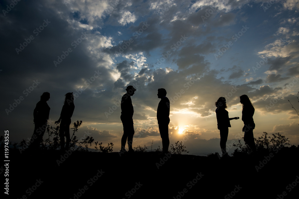 group of young people silhouette