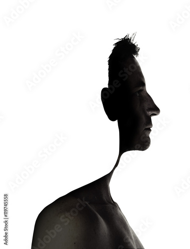 surrealistic portrait of a young man with cut out profile